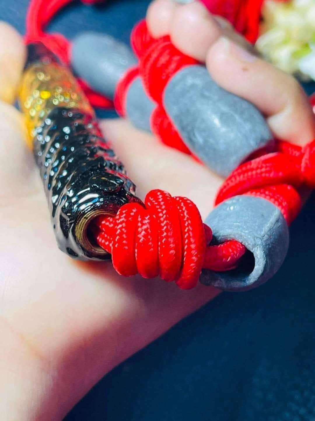 Takrud Sai Niew Kongkaphan Maha Ud by Luang Pho Poon Thammapphalo - Thai Amulet for Resilience and Unbreakable Strength