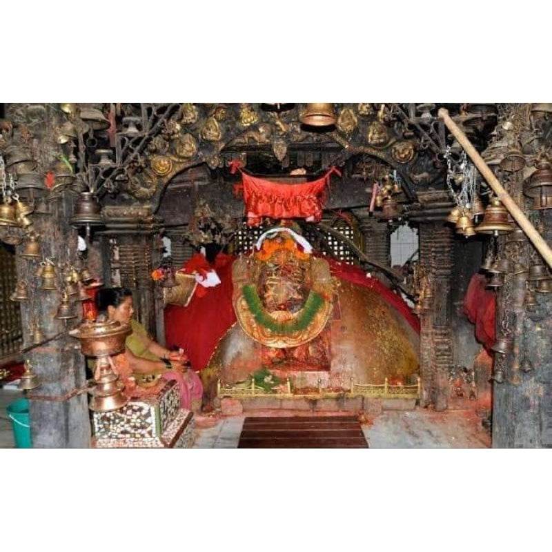 Traditional ornate Buddhist shrine featuring a premium Buddhist amulet for prosperity inside temple