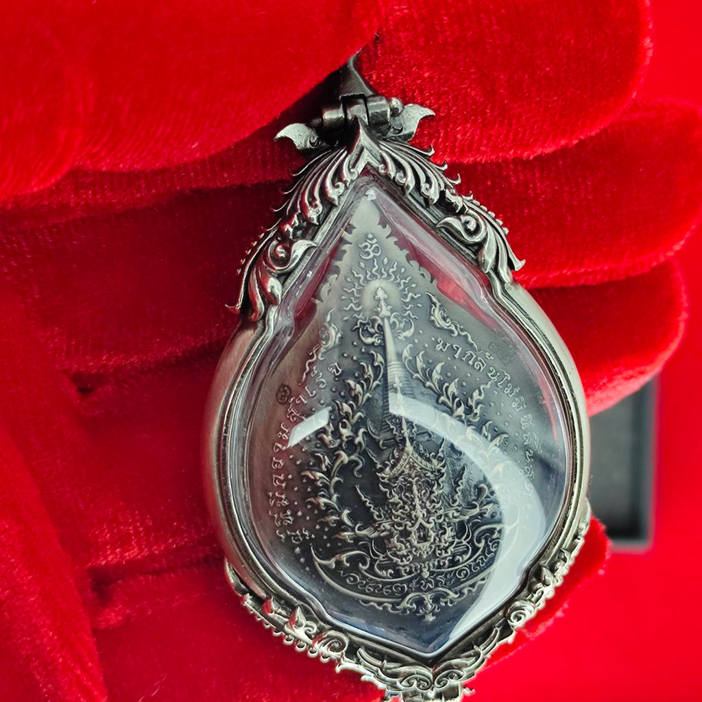 Prosperity Ganesh pendant Thailand featuring intricate designs and a clear protective stone