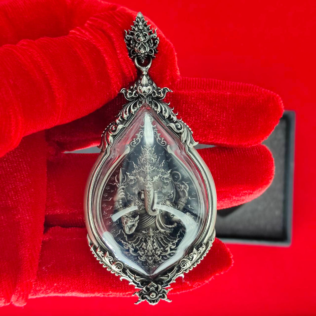 Prosperity Ganesh pendant Thailand with intricate silver design and protective casing