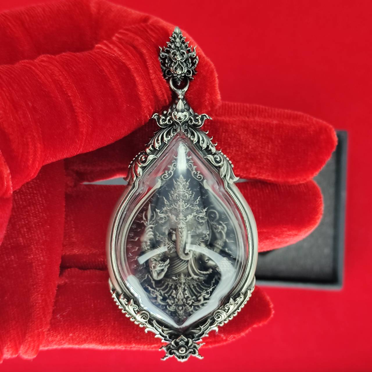 Prosperity Ganesh pendant Thailand in silver setting, showcasing intricate design and craftsmanship