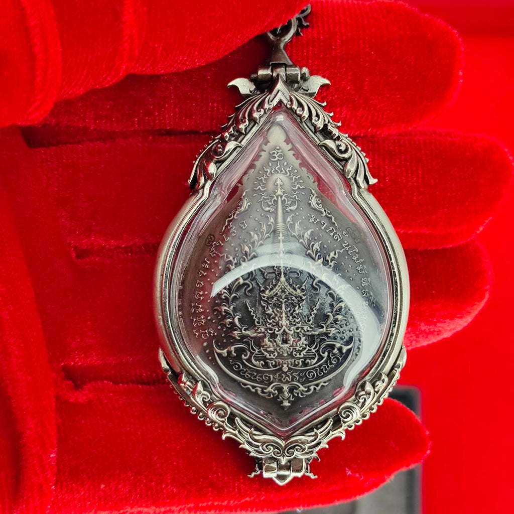 Intricately designed prosperity Ganesh pendant Thailand with detailed silver frame and mystical artwork