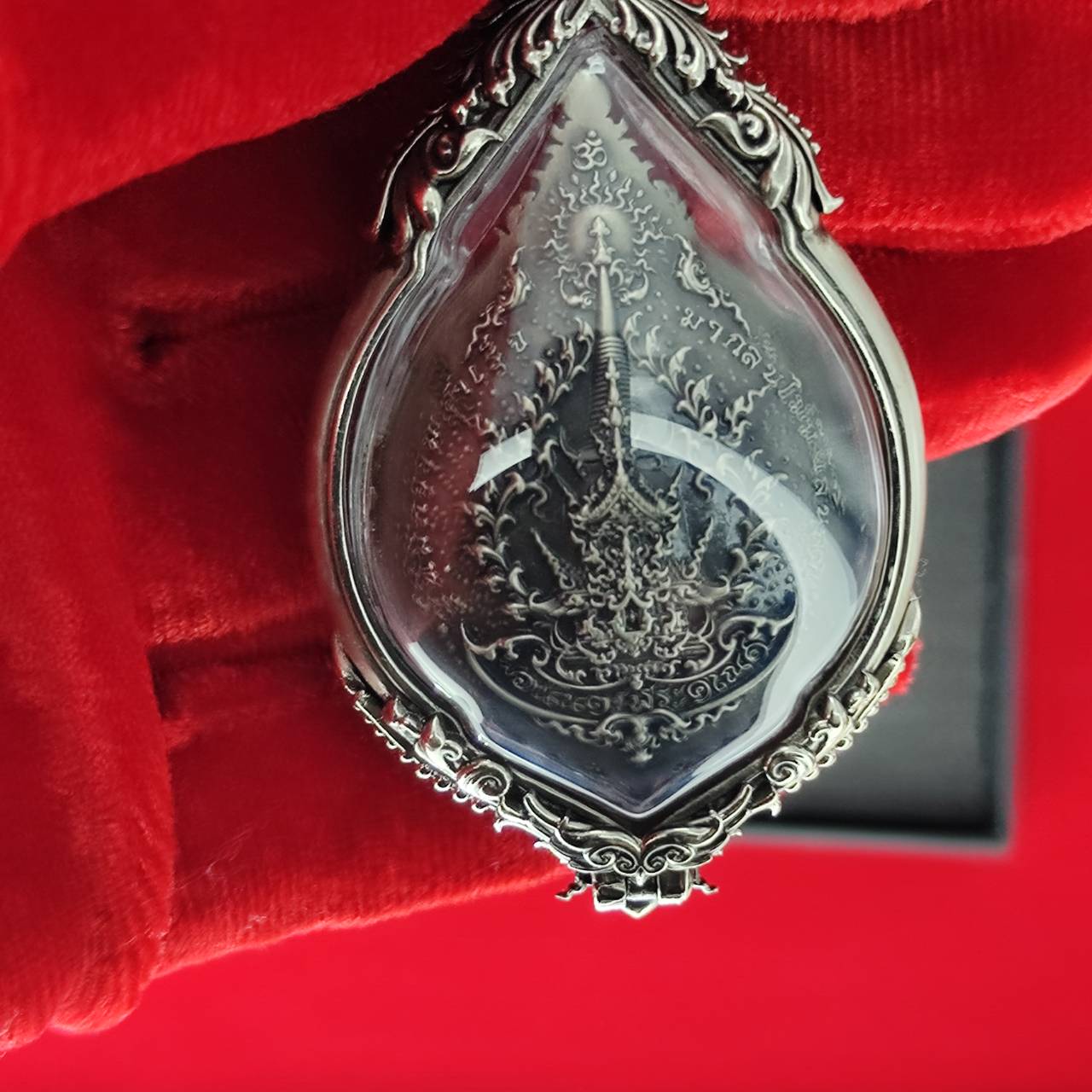 Silver prosperity Ganesh pendant Thailand featuring intricate engravings in an elegant design