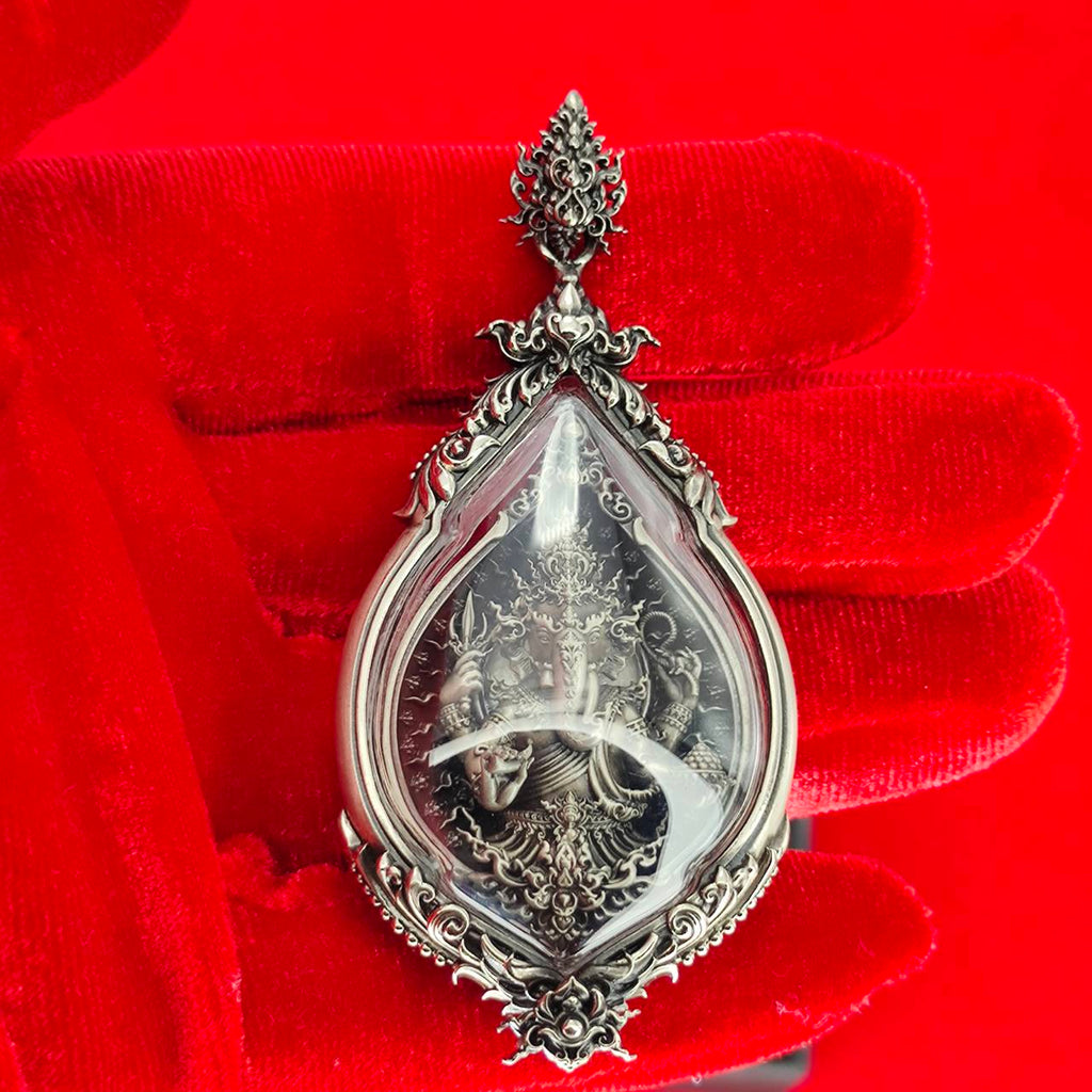 Prosperity Ganesh pendant Thailand in ornate silver setting, showcasing intricate carving and clear crystal design