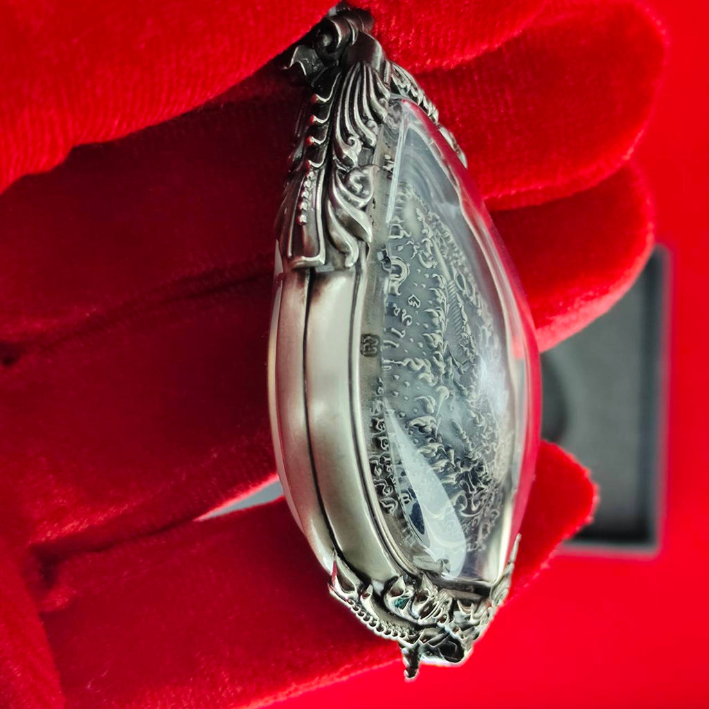 Prosperity Ganesh pendant Thailand with intricate silver detailing and protective casing