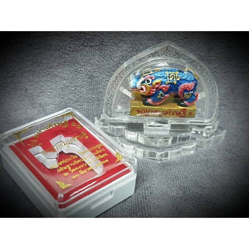 Colorful prosperity pig lucky charm Thailand with protective casing for good fortune and blessings