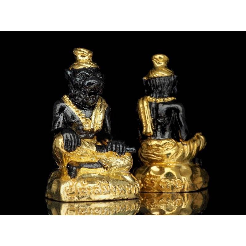 Black and gold Pu Jao Saming Prai spirit talisman figurine with intricate details and traditional attire
