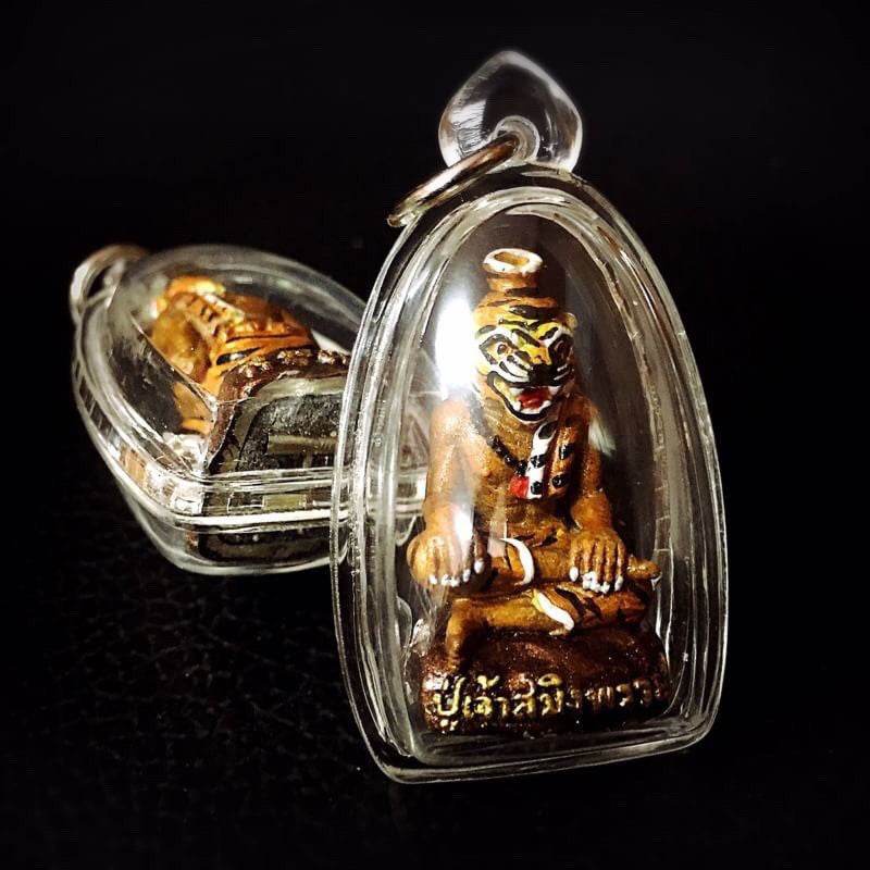 Pu Jao Saming Prai spirit talisman with tiger figure encased in clear protective cover