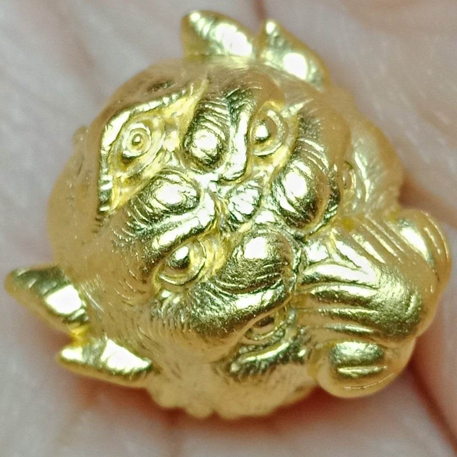 Golden Si Hu Ha Ta bracelet by Master Subin with intricate animal designs for feng shui and spiritual practice