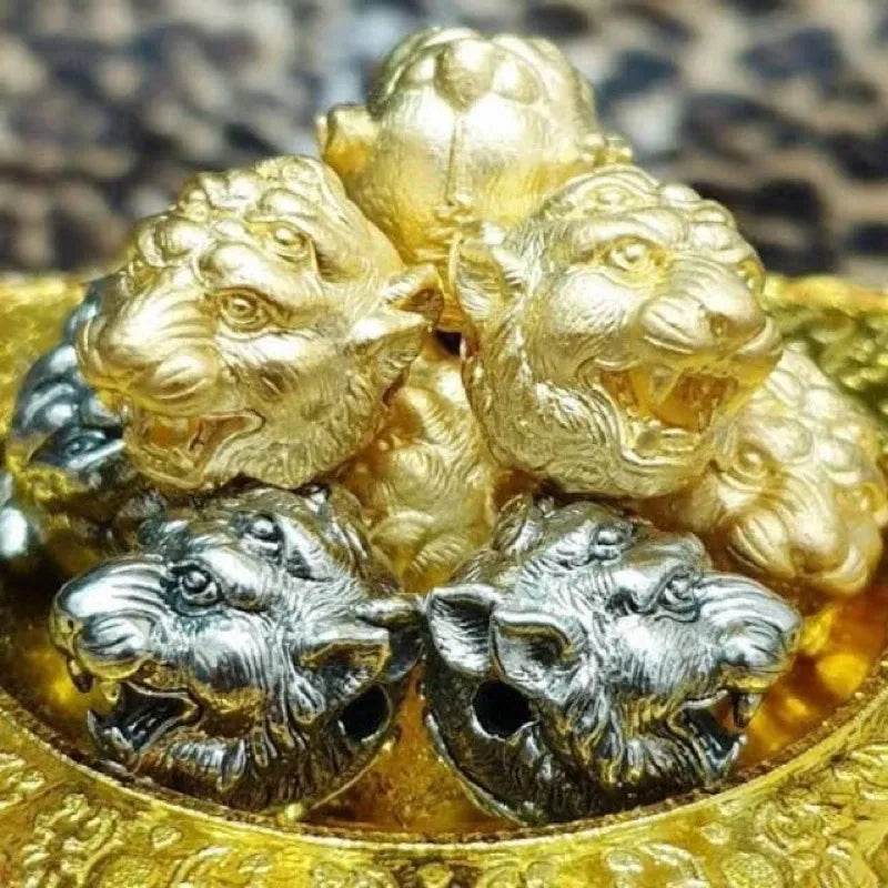 Si Hu Ha Ta bracelet by Master Subin featuring intricately designed golden and silver lion motifs