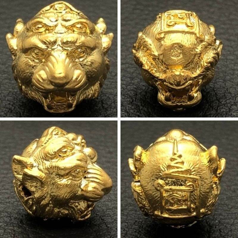 Si Hu Ha Ta bracelet by Master Subin featuring intricate gold lion head beads with detailed carvings