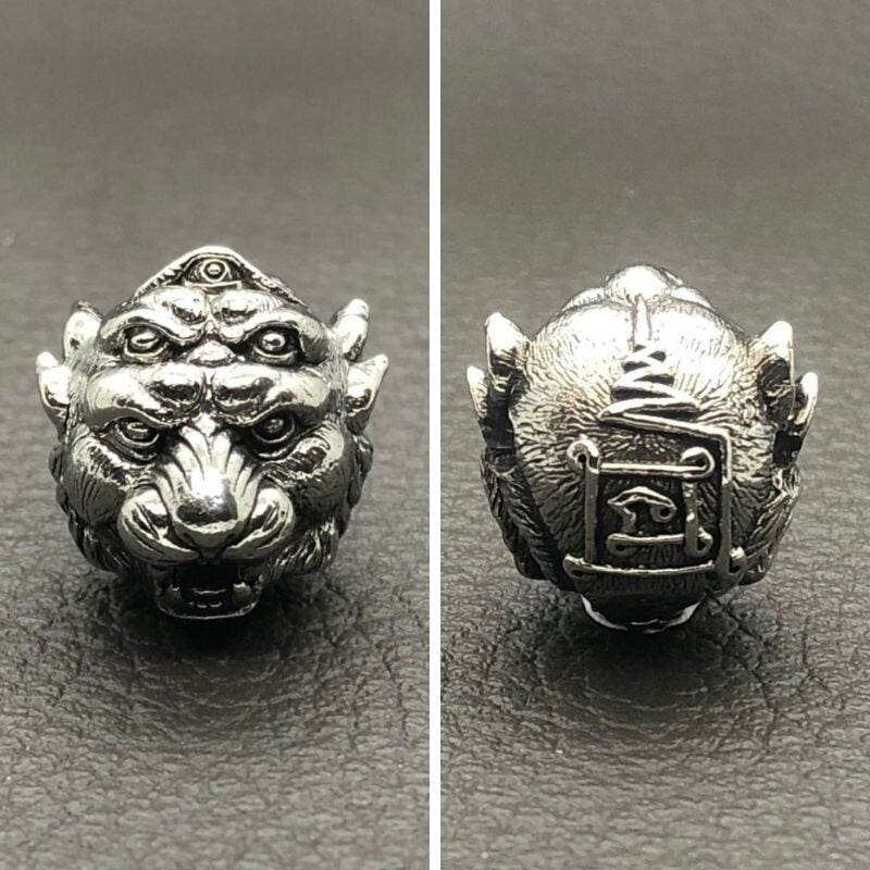 Detailed silver Si Hu Ha Ta bracelet by Master Subin featuring a lion head design with intricate engravings