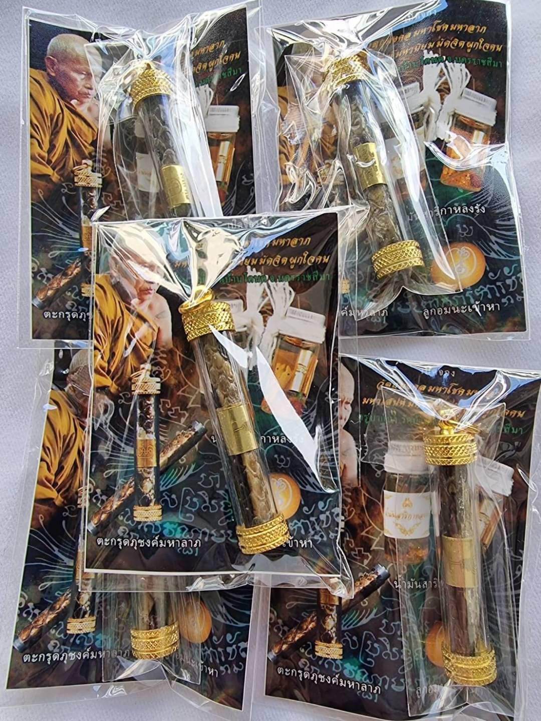 Python skin takrud amulet packaged for spiritual protection and good fortune, from Thai Blessing Co