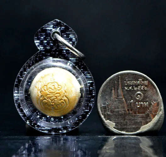✨ Radiate Charm & Command Respect – Golden Face Charm Orb by Luang Pho Wan for Love, Persuasion & Prosperity