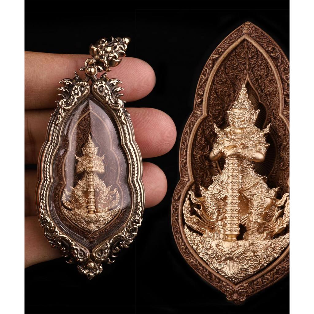 Rare Vessavana amulet Thailand in ornate gold casing, showcasing intricate details and craftsmanship