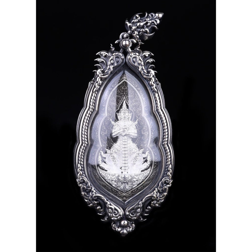 Rare Vessavana amulet Thailand in ornate silver casing, ideal for spiritual protection and good fortune