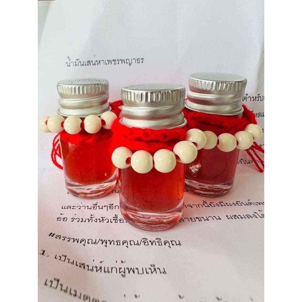 Sacred Phet Phaya Thorn Oil Charm for Love, Popularity, and Abundance Elixir