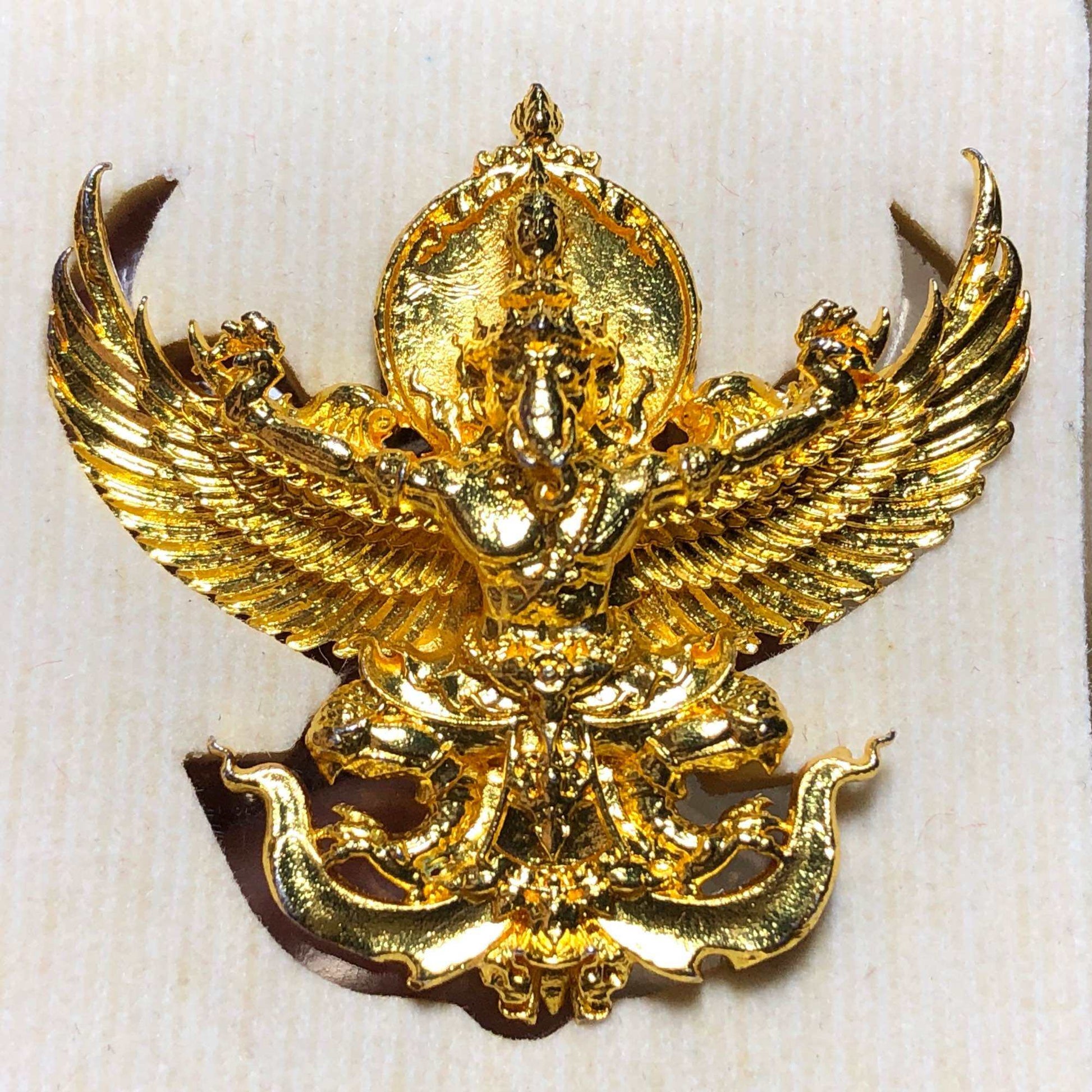 Gold-plated Sacred Thai elephant-bird amulet showcasing intricate winged deity design for home decor