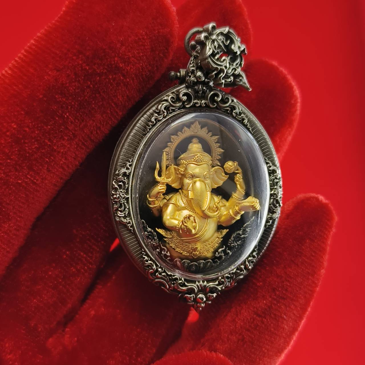 Thai Ganesh pendant white satin gold ornate silver frame amulet featuring detailed gold Ganesh on red cloth