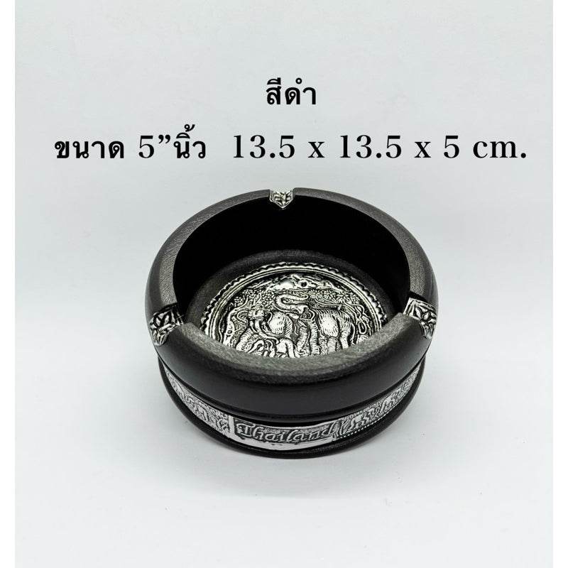Black handcrafted mango wood ashtray with intricate silver elephant design and decorative metal accents