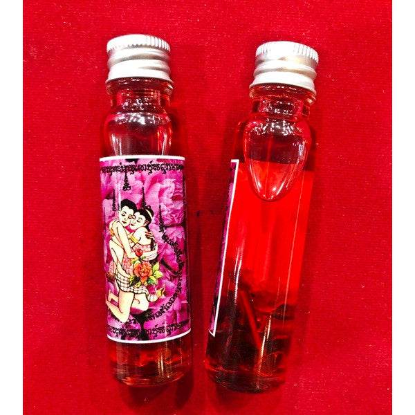 Twin Dolls Love Oil – Ultimate Charm &amp; Fortune Booster by Master Prakong Love. Prosperity. Magnetism. - Thai Blessing Co