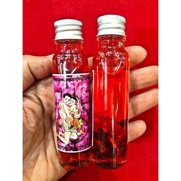 Twin Dolls Love Oil – Ultimate Charm &amp; Fortune Booster by Master Prakong Love. Prosperity. Magnetism. - Thai Blessing Co
