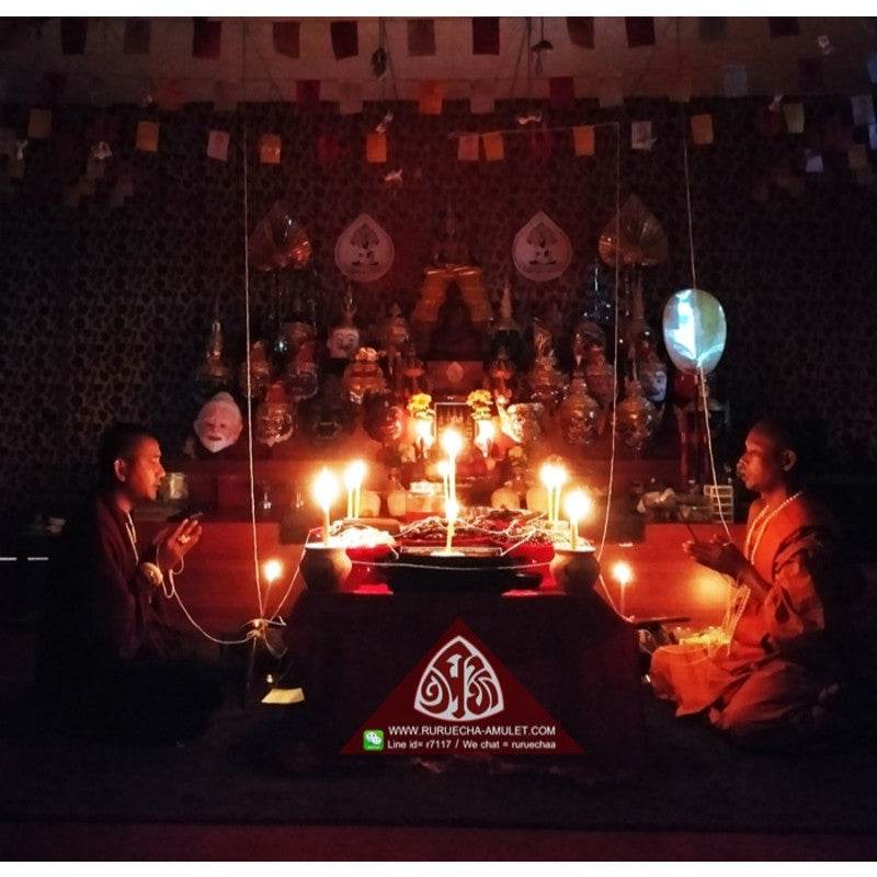 Thai Blessing Co ceremonial blessing with monks and candlelit altar for Thai love attraction oil ritual