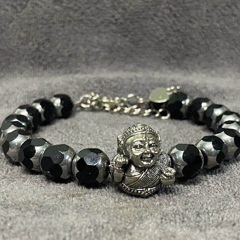 Thai prosperity bracelet for business success featuring black and silver beads with detailed charm