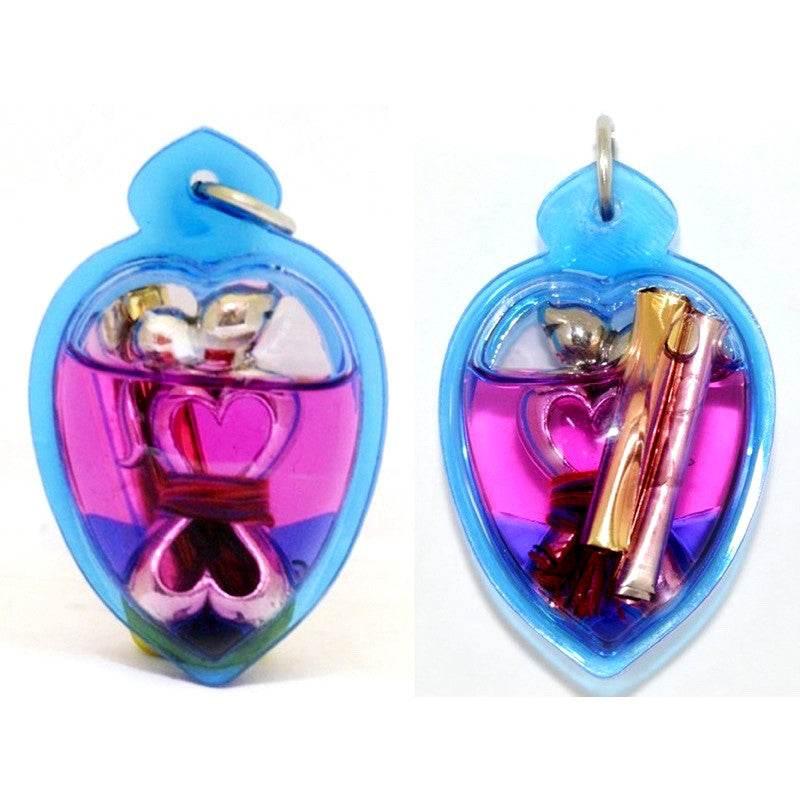 Dual Charm Thai Love Pendant - Elegant Twin Figures in Herbal Oil Casing | 泰式双人魅力吊坠 - 植物精油封装的双体工艺饰品