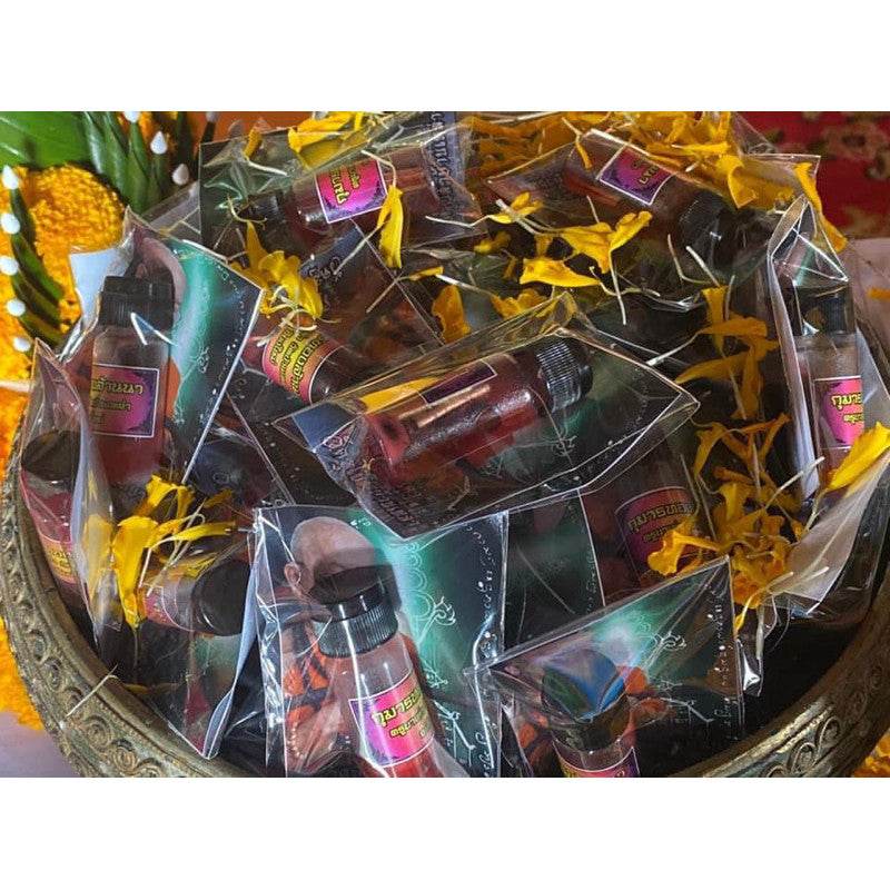Risk Fortune Oil by Kru Ba Tao – Thai Wealth &amp; Attraction Talisman | Snake Oil for Financial Growth, Business Success &amp; Charismatic Power - Thai Blessing Co