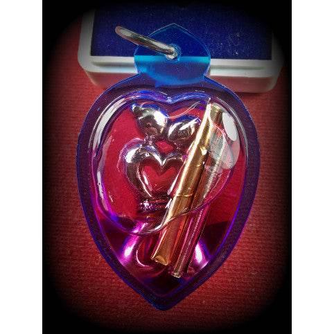 Dual Charm Thai Love Pendant - Elegant Twin Figures in Herbal Oil Casing | 泰式双人魅力吊坠 - 植物精油封装的双体工艺饰品