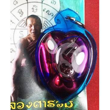 Dual Charm Thai Love Pendant - Elegant Twin Figures in Herbal Oil Casing | 泰式双人魅力吊坠 - 植物精油封装的双体工艺饰品