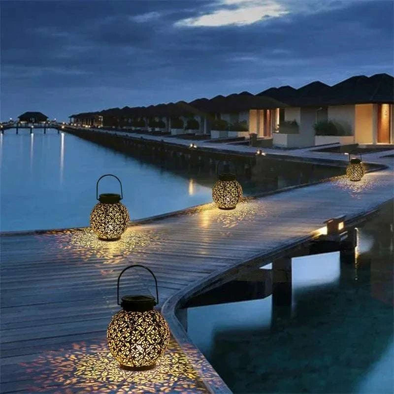 Solar LED Lantern with Hollow Wrought Iron Design – Waterproof Outdoor Hanging Projection Lamp for Garden and Yard Decor