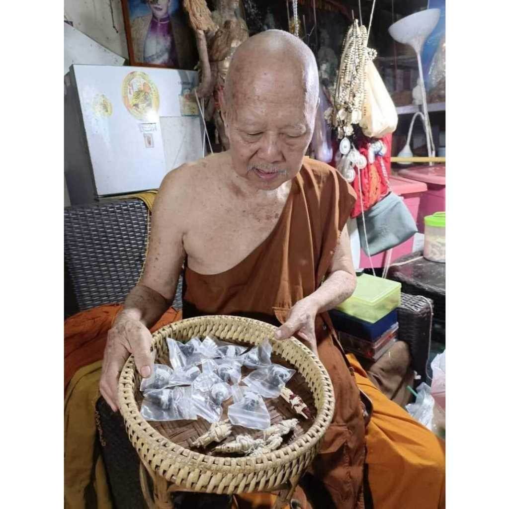 Buddhist monk holding a basket of spiritual amulets for attraction and relationship in a serene temple setting