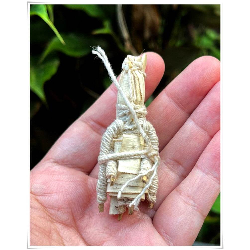 Handheld spiritual amulet for attraction and relationship showcasing intricate details and craftsmanship