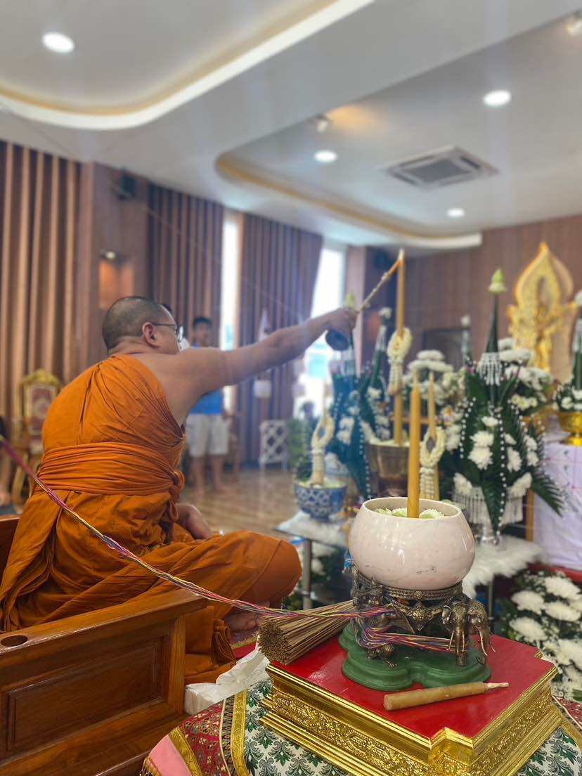 Supreme Brahma amulet by Phra Ajarn Weeraphon being blessed in a traditional Thai ceremony