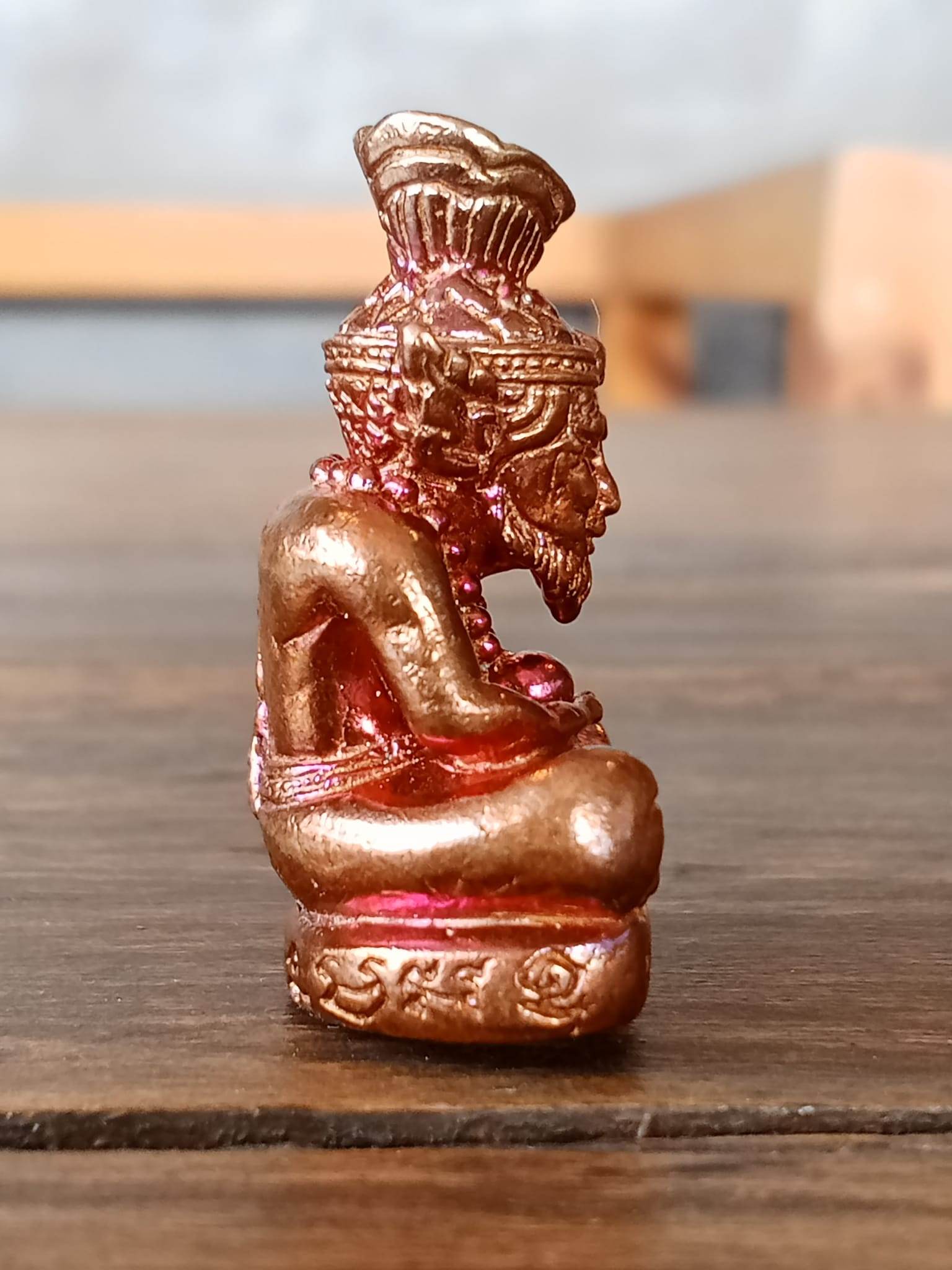 Supreme Ruesi Narot amulet in bronze color showcasing intricate details for spiritual protection