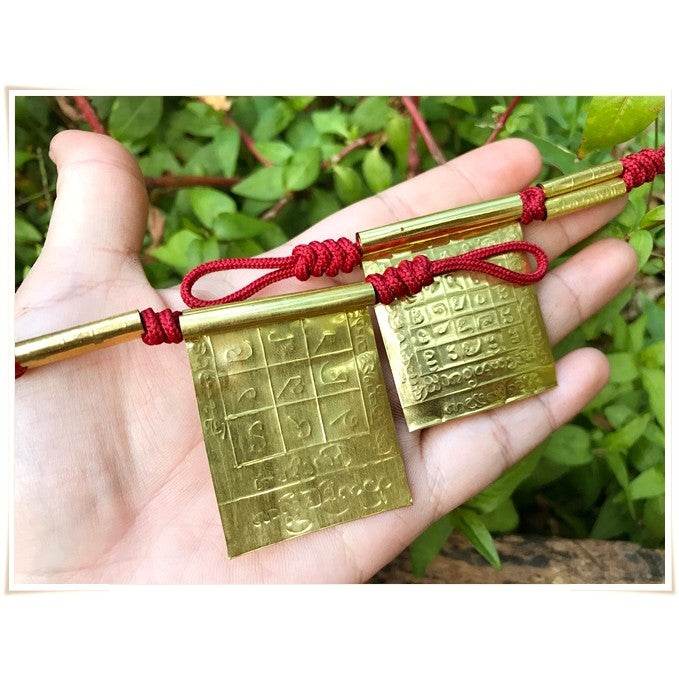 Takrud Maha Phitsawat love charm in bronze with intricate designs for enhancing love and relationships