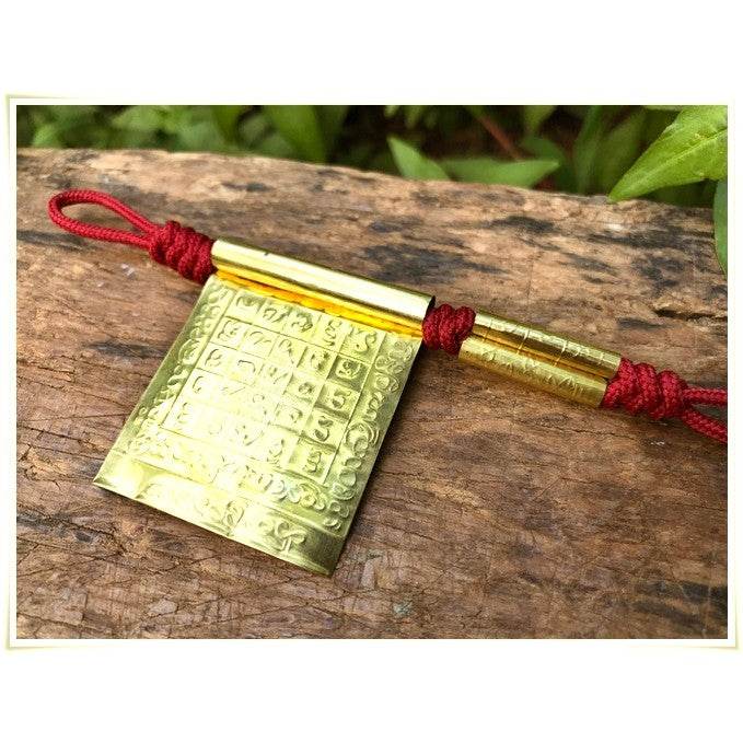 Takrud Maha Phitsawat love charm in gold with intricate engravings for enhancing love and relationships