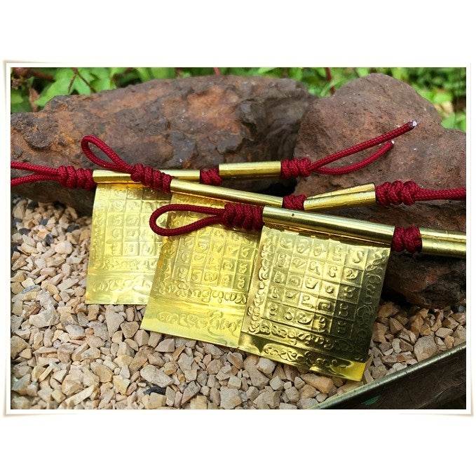Takrud Maha Phitsawat love charm made of gold with intricate designs for enhancing love energy