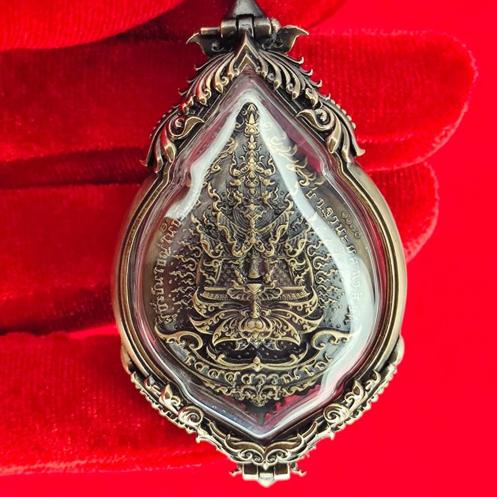Tao Wessuwan amulet for protection in intricate silver casing, designed for spiritual defense and home decor