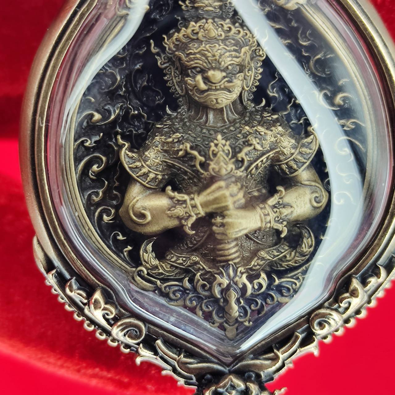 Tao Wessuwan amulet for protection featuring intricate details and a protective aura in a decorative frame