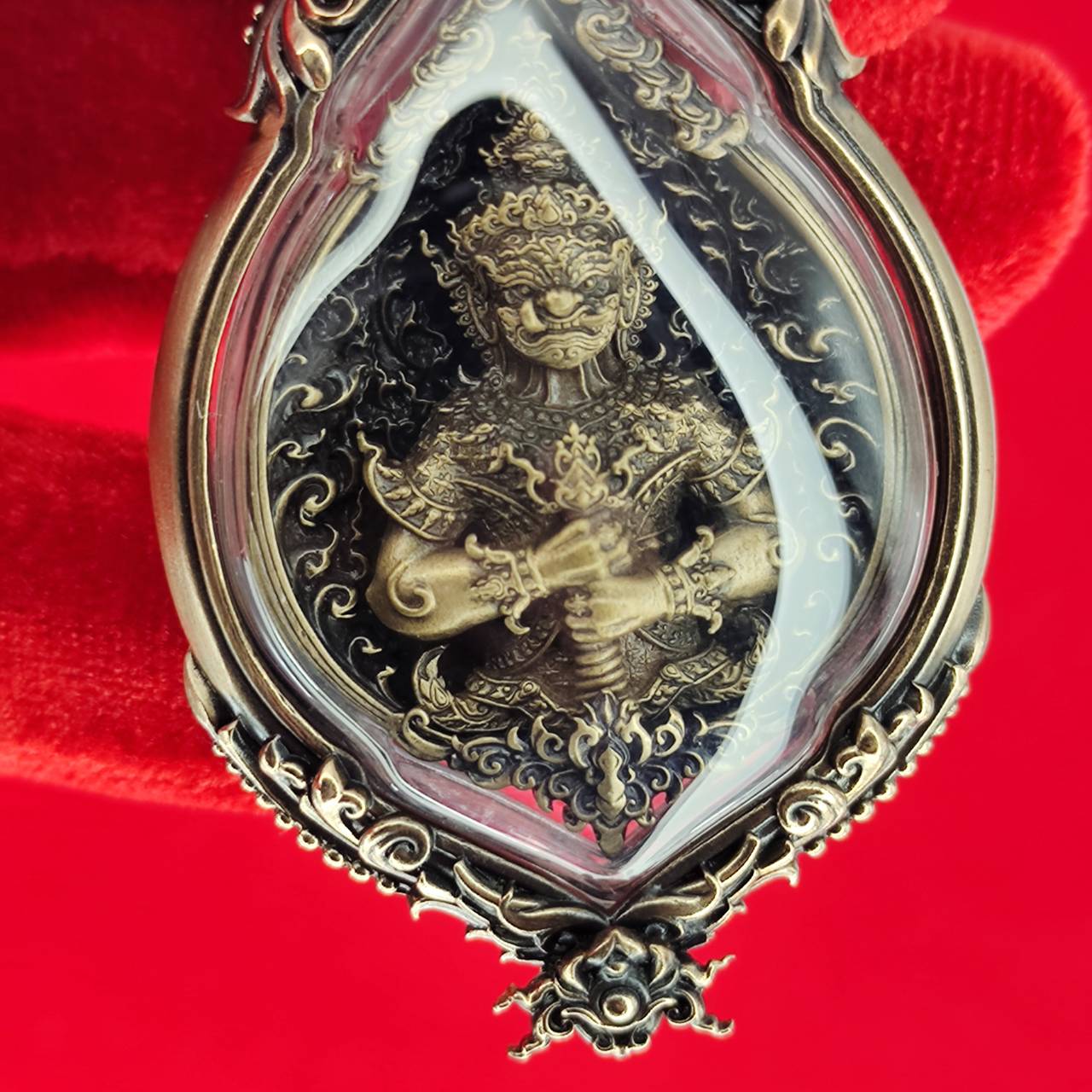 Tao Wessuwan amulet for protection in ornate casing with intricate designs and details