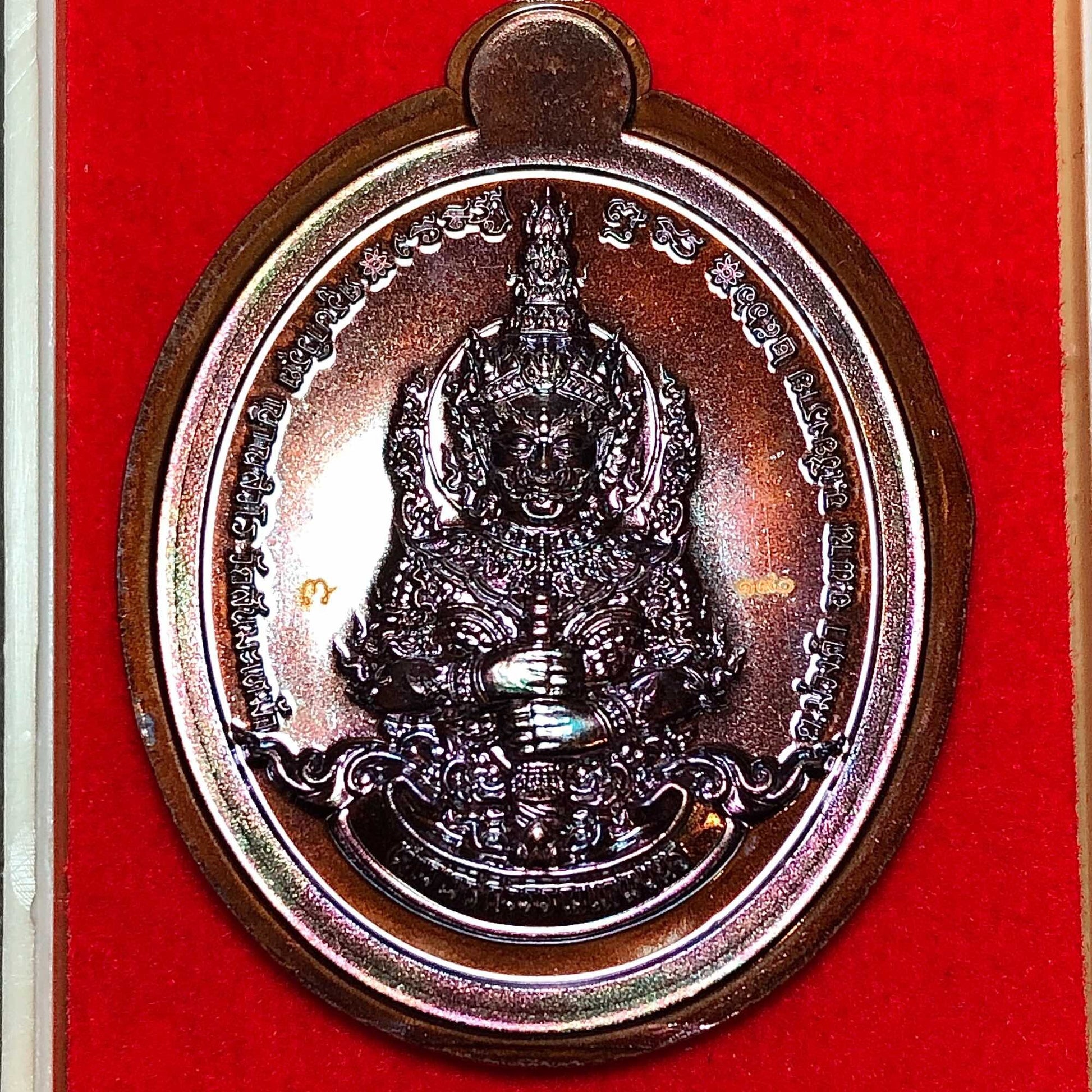 Tao Wessuwan amulet for wealth featuring intricate design and protective symbolism in shiny bronze finish