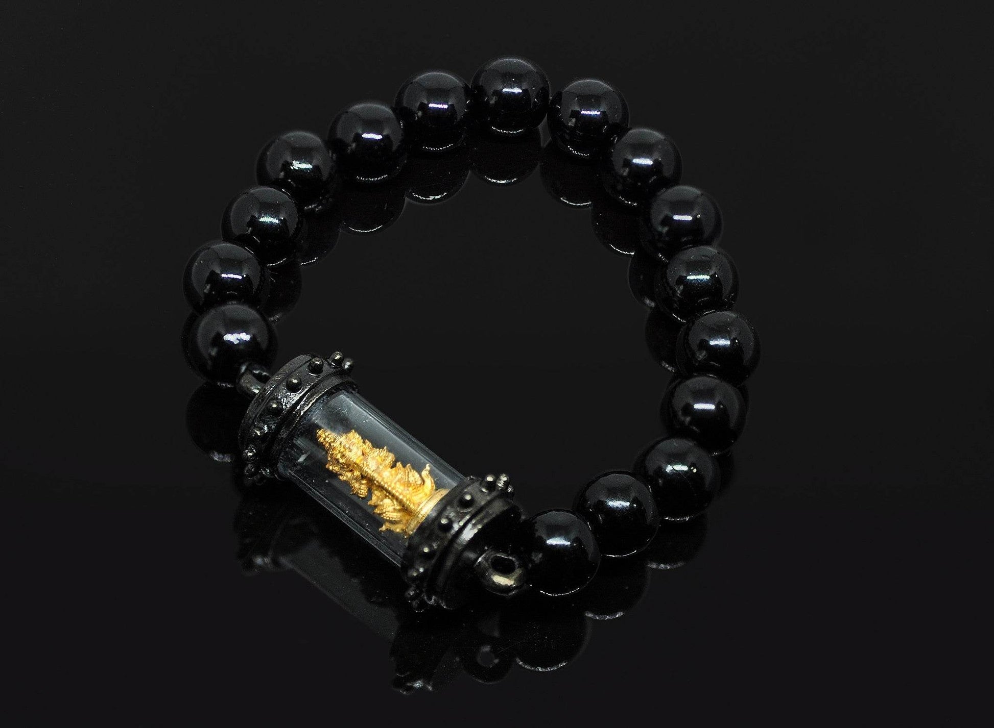 Tao Wessuwan amulet Thailand in a black bead bracelet for protection and good fortune