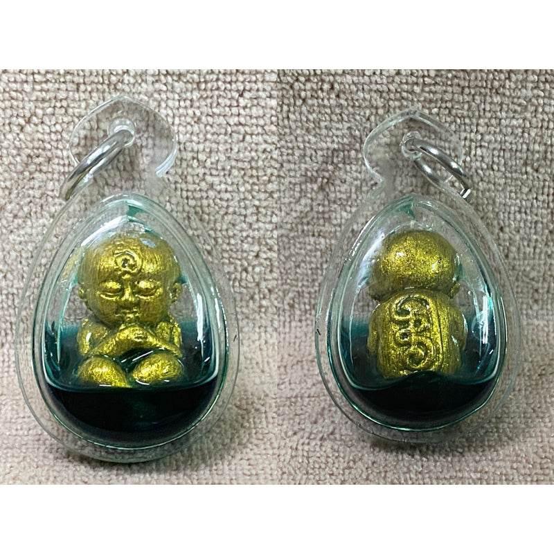 Millionaire Ghost Fetus Charm - Kumarn Dud Rok Maha Heng by LP Mian, Wat Ban Ja Niang, Buriram Charming herb powder encased in oil