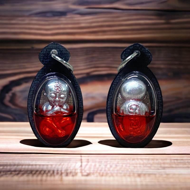 Millionaire Ghost Fetus Charm - Kumarn Dud Rok Maha Heng by LP Mian, Wat Ban Ja Niang, Buriram Silver encased in oil