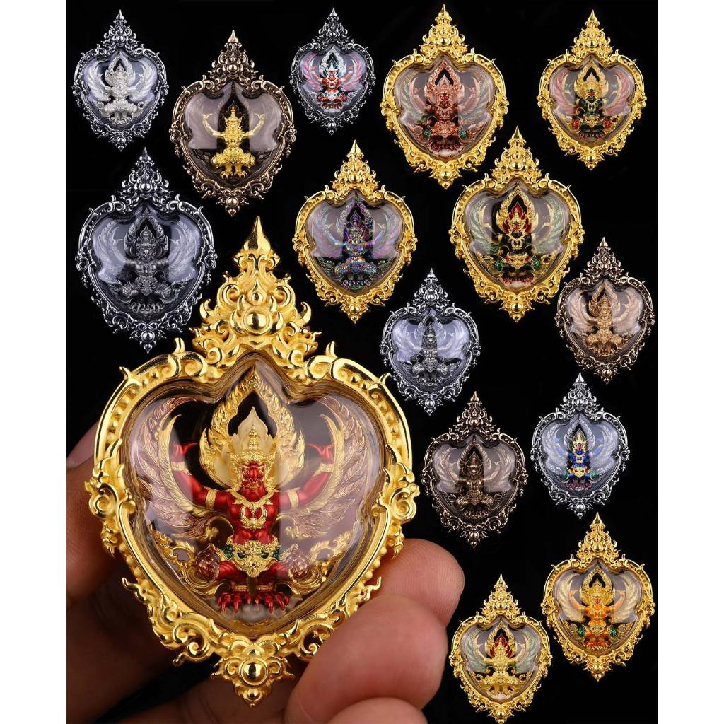 Collection of intricately designed Garuda amulets for wealth and protection in ornate frames