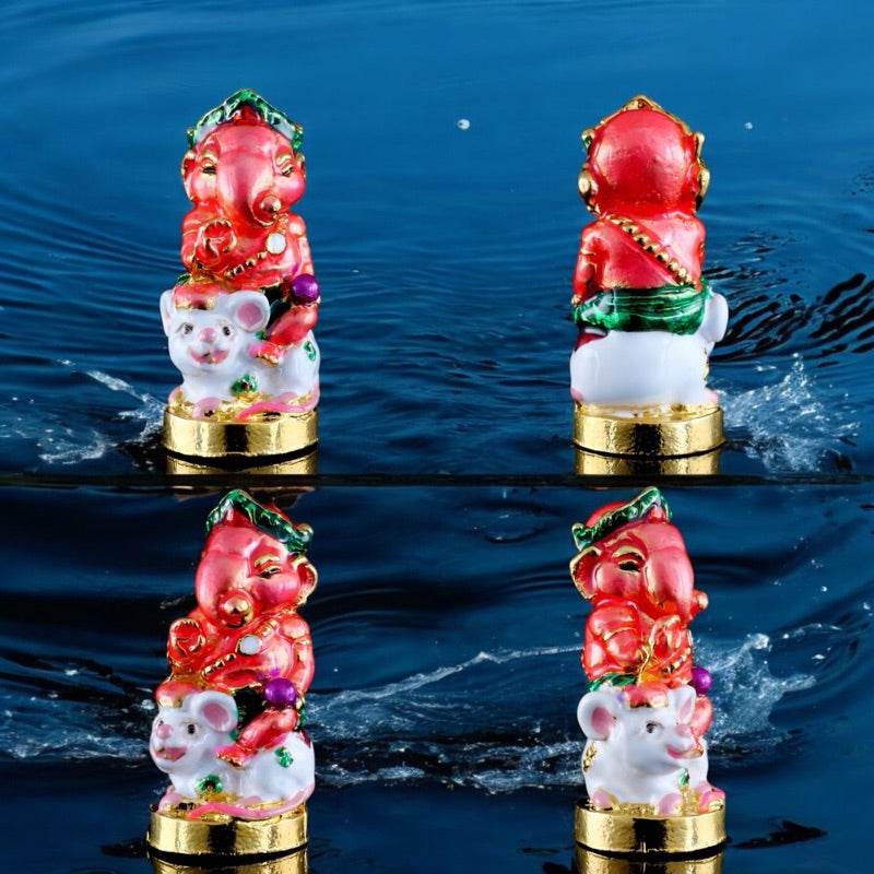 Ganesha blessing amulet Thailand with vibrant colors and gold base displayed from multiple angles
