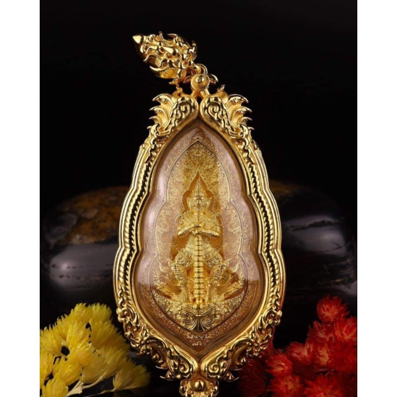 Vesuwanno amulet for wealth and protection in ornate gold frame, symbolizing prosperity and security